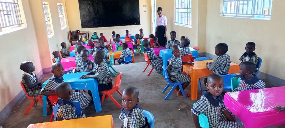 A teacher with pupils in a St. Mary's classroom